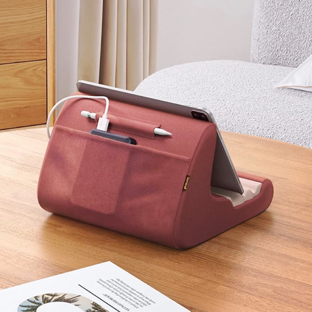 Innovative tablet pillow with stand and pocket